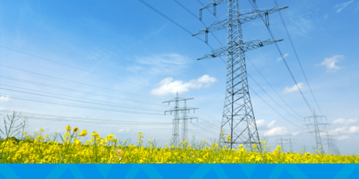 high voltage transmission line against blue sky